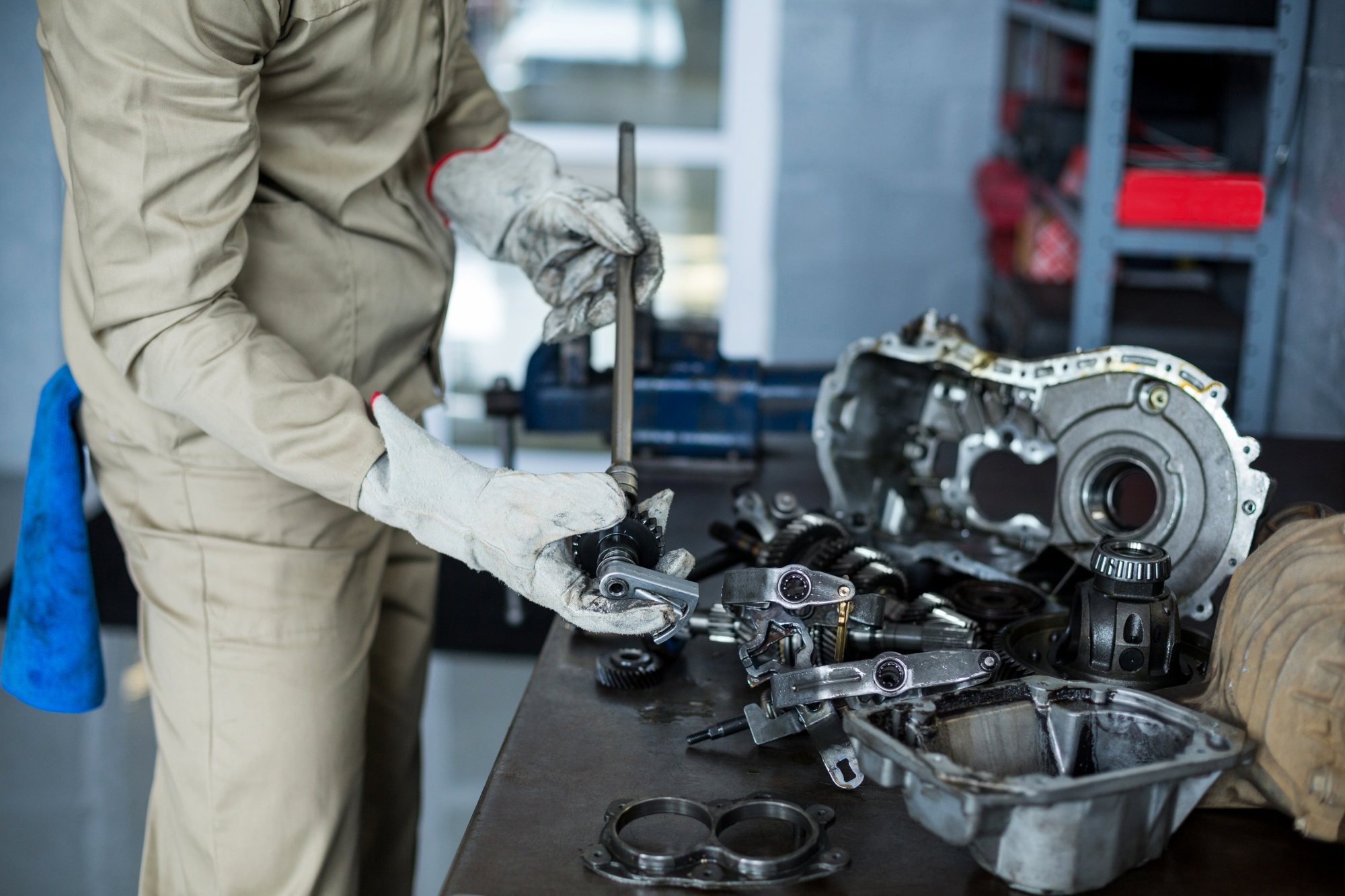 Expert mechanic working on transmission repair